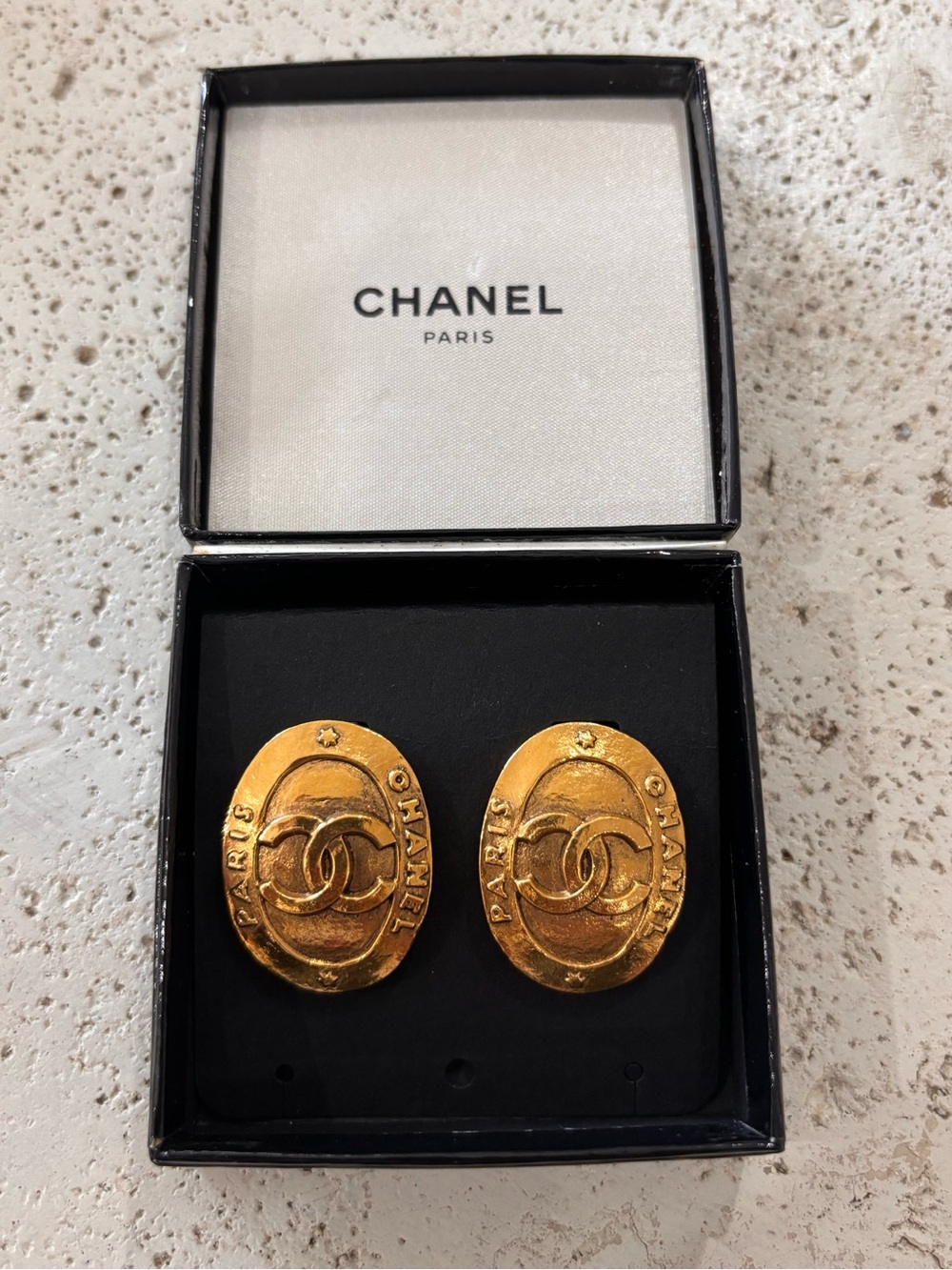 Authentic CHANEL 1990s gold plated oval clip on earrings